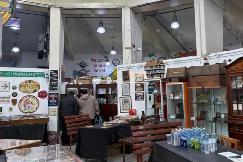 Display cabinets and boards at the museum in Coventry Market