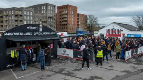 Getty Images Fans gathering outside York Road ahead of a match
