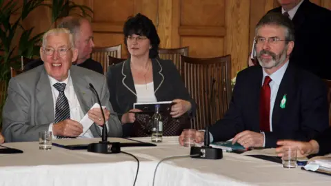 PA Media Ian Paisley, Arlene Foster and Gerry Adams at the 2007 negotiations 