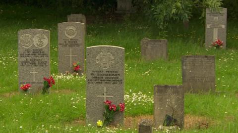 Flowers on war graves in Hull's Western Cemetery