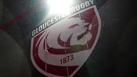 PA Media The Gloucester Rugby emblem.