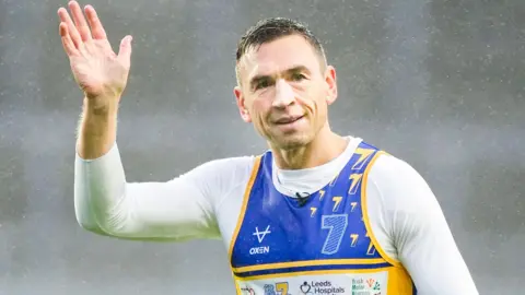 Danny Lawson/PA Wire Kevin Sinfield waves after completing his run on day seven of the 7 in 7: Together 2025 Challenge at AMT Headingley Rugby Stadium, Leeds. 