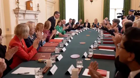 Inside a government cabinet meeting.