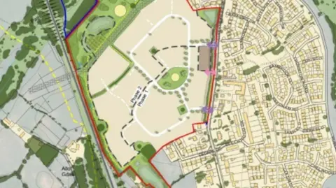 A map showing plans for new housing in an area surrounded by green areas