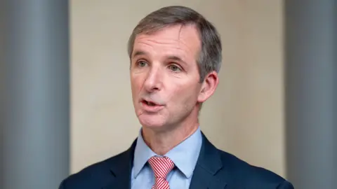 PA Media Liberal Democrat MSP Liam McArthur looking slightly off camera.