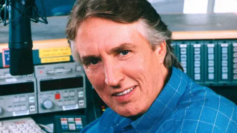 Johnnie Walker pictured in a radio studio in 2000