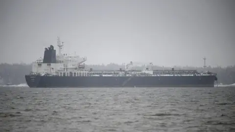 Getty images of Eagle's ship from afar on a gray, cloudy day.