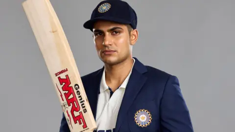Shubman Gill poses with his newest Test bat, inscribed with his 'Prince' nickname