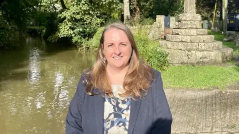 Conservative party Lucy Trimnell by a river.