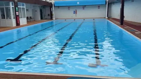 A lido, with walls on all sides, and five swimming lanes.