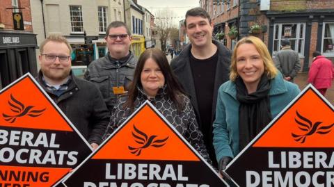 Lib Dem councillors with MP Helen Morgan