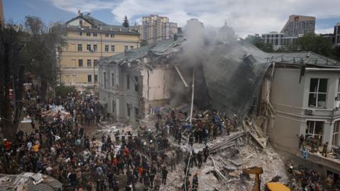 Smoke rises from collapsed hospital roof in Kyiv
