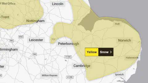 Met Office A Met Office map shows an area where a yellow warning for snow is in place in parts of the East of England