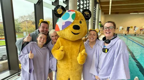 Left to right, Charlotte Cory, James Vickery, Caroline Adams, Pudsey the bear, Lucy Bolt and Caroline Densley.