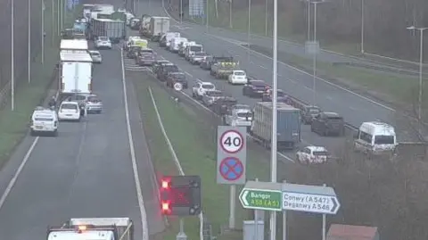 Traffic Wales Traffic is seen queuing on the A55 in a Traffic Wales traffic camera