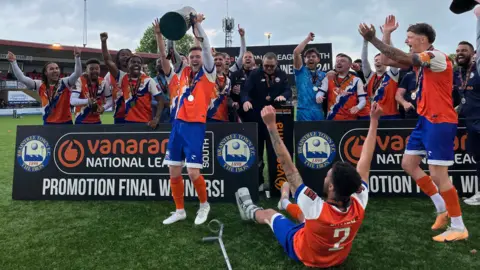 Tom Larsen-Wright/BBC Braintree Town players celebrate promotion