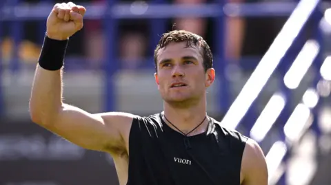 Jack Draper celebrates win over Marcos Giron at Eastbourne