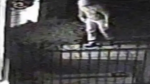 SURREY POLICE The Night Watcher caught on CCTV during a break in in Maidenhead