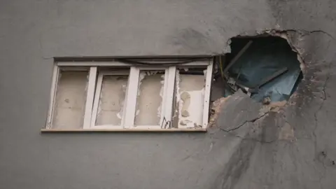 Building damaged by Hezbollah attack in Kibbutz Menara, northern Israel (27 November 2024)