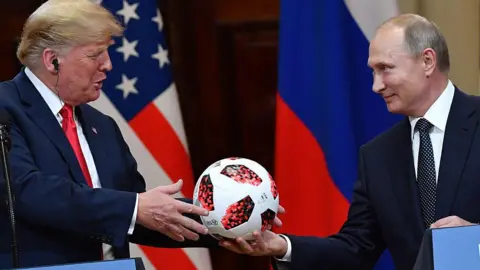 Vladimir Putin smiled as he handed Donald Trump to Donald Trump in a meeting in Helsinki, Finland in July 2018. The couple are behind the American and Russian flags. 