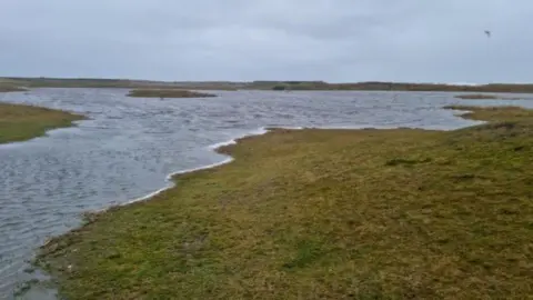 Flooded Golspie golf course