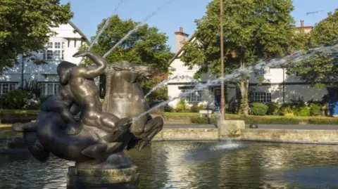 The fountain and pond before they dried up