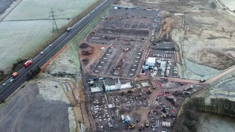 Aerial photo of construction work underway at the site of the first phase of Robbie McCrone Battery Park