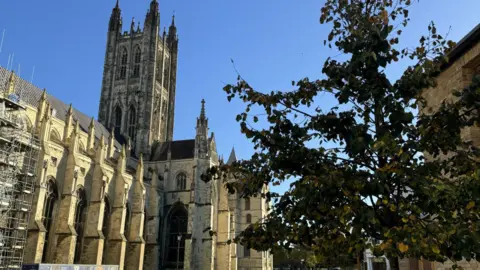 An external view of Canterbury Cathedral taken on a sunny day.