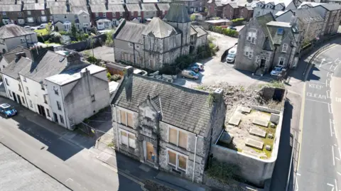 Aerial view of the derelict former police station and old courthouse site.