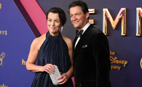 Getty Images Olivia Williams and Dominic West astatine  the 76th Primetime Emmy Awards held astatine  Peacock Theater connected  September 15, 2024 successful  Los Angeles, California