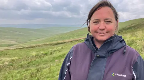 A photo of Sorcha Lewis who farms land near Monks Trod