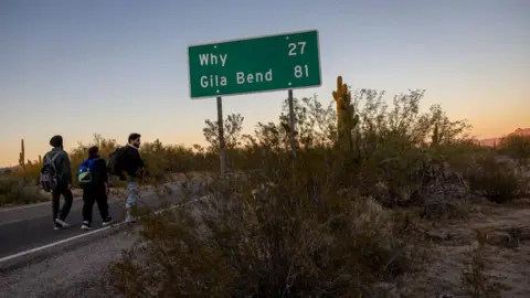 AFP On December 7, 2023, migrants from India entered the United States after crossing the US-Mexico border in Lukeville, Arizona.