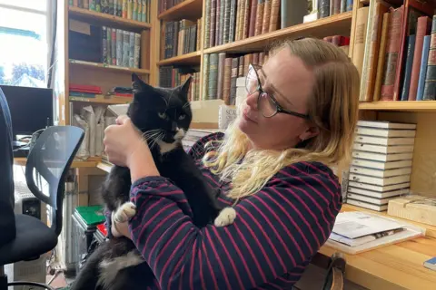 Eve Booker with Beano the cat