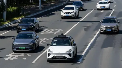 Getty Images A Baidu driverless robo-taxi in Wuhan, China