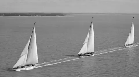 Charles E. Brown/Royal Air Force Museum/Getty Images J Class yacht Shamrock V leads Britannia and Velsheda, Cowes Regatta 1933