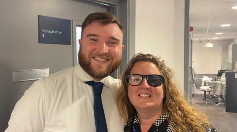 Alaina Ratcliffe with a Beccles Specsavers staff member