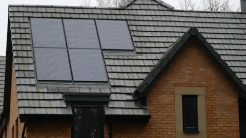 PA Media A house with solar panels added to the roof