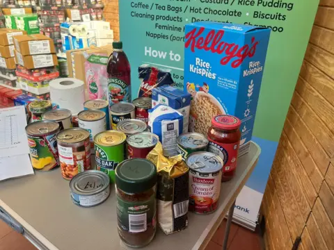 Tinned food at the centre in The Meadows ready to be donated