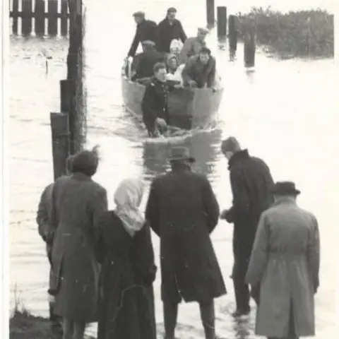 G W Stone Fred Sadd saving people in a boat in Gorleston-on-SEa