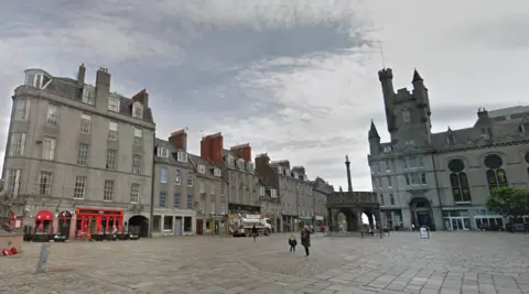 Aberdeen's historic Castlegate area, showing the Mercat Cross and Salvation Army Citadel