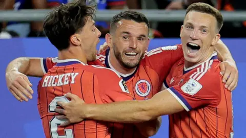 John McGinn celebrates