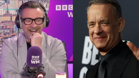 Split view image. On left Ed James, grey blazer, black rimmed glasses and headphones. On right, Tom Hanks wearing a black shirt, tie and jacket smiling at camera.