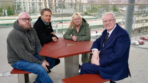 BBC Paul Price, Edward Daffarn, Margaret Aspinall and Jeff Edwards sat around a table