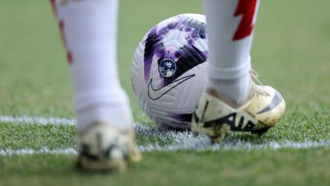 View of the match ball with the Premier League logo as a player prepares to take a corner during the Premier League match between Arsenal FC and Everton FC at Emirates Stadium