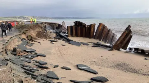 The A379 Slapton Line between Torcross and Slapton. The image shows subsidence and crumbled sea defences.