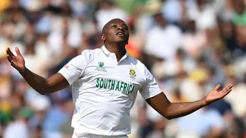 South Africa's Kasigo Rabada celebrates his five-wicket haul against Australia