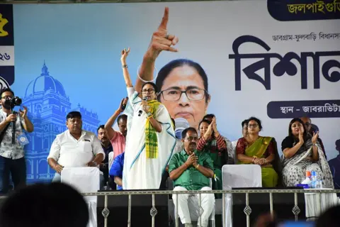 NurPhoto via Getty Images West Bengal's Chief Minister and leader of the All India Trinamool Congress (AITC) party, Mamata Banerjee, speaks during a public meeting at an election campaign rally 
