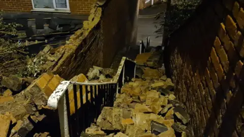 Luke Drayton Debris from the wall collapse
