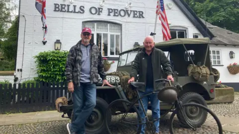 Andy and Ian Gough with their US Army Jeep outside the Bells of Peover pub