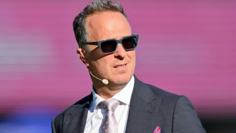 Michael Vaughan looks on